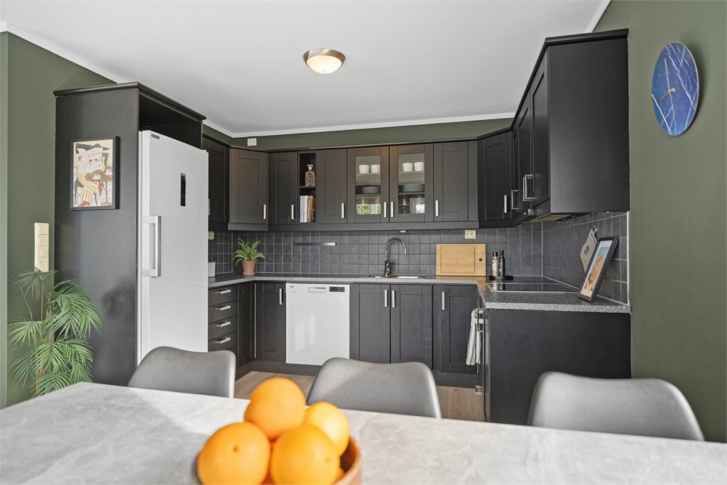 Moderne kjøkken med gjennomført stil