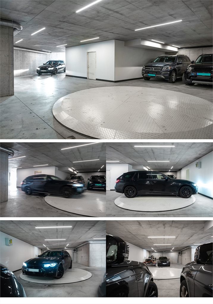 Gjennomført garasje med god plass og praktisk bilkarusell for enkel manuvrering 